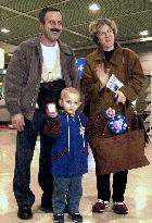 Albanian boy returns to Kosovo after treatment in Japan